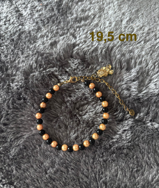 Handgemaakte armband van 19,5 cm met zwarte en goudkleurige kralen, verstelbare gouden sluiting