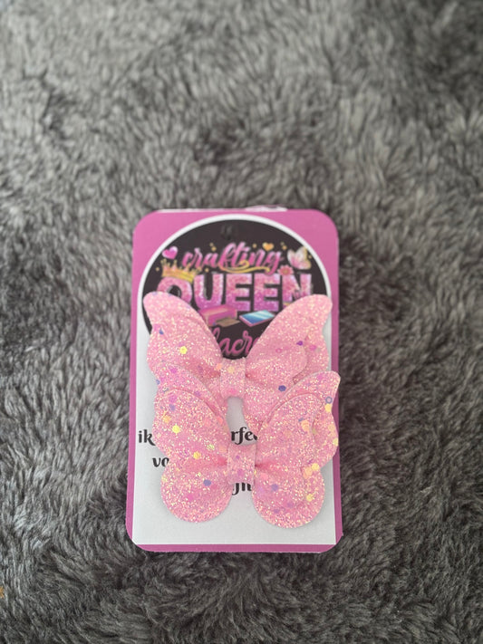 Glitter vlinder haarstrikje roze