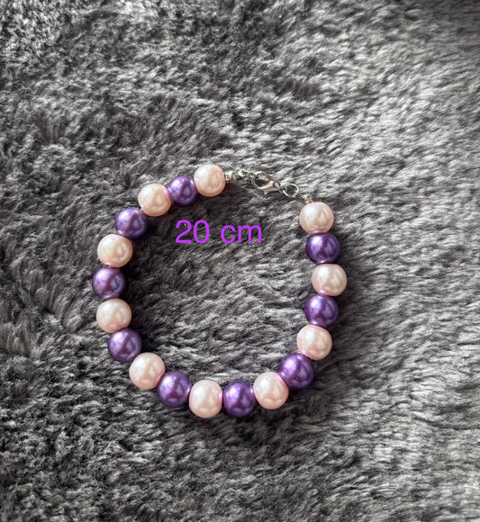 Handgemaakte armband van paarse en parel roze glas kralen, 20 cm lang.